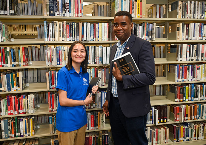 Galveston College Criminal Justice Program Coordinator, Andre Isbell, Ph.D., talks to GC student, Brittany Gutierrez, at the college’s main campus in Galveston. (COURTESY PHOTO)