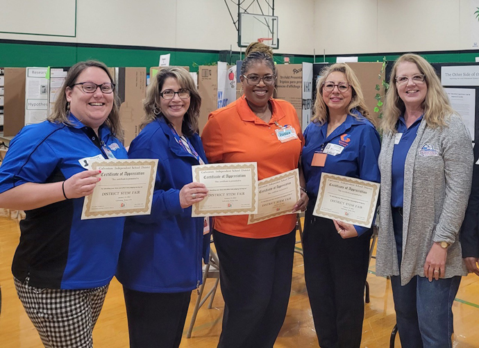 GC regent, faculty serve as volunteer judges at GISD Science Fair