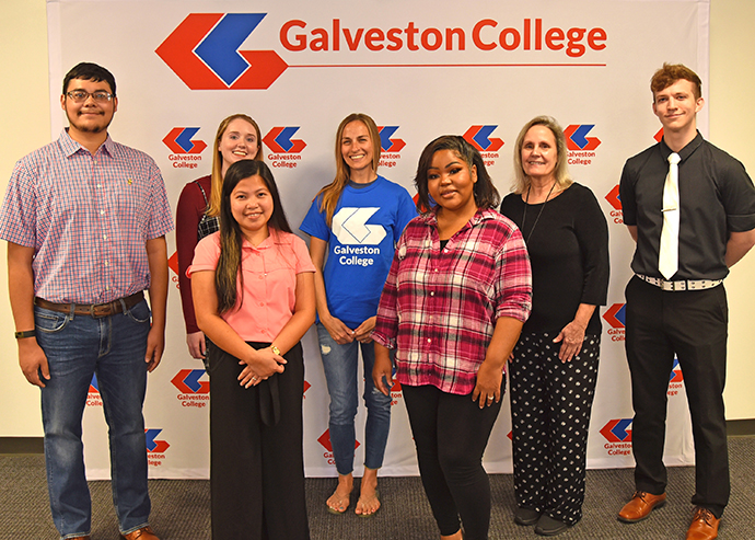 The Galveston College PTK Sigma Gamma Chapter achieved Five-Star status for the first time since 2004. From left to right, Galveston College PTK Sigma Gamma Chapter President John Vela, PTK member Miranda Donaldson, PTK lead member Jacqueline Mitchell, PTK Treasurer Kendra Henry, PTK Secretary Roma Emmett, Galveston College PTK Advisor and Assistant Professor of Government, Regina Durante, Ph.D., and PTK member Koriel Lopez. PTK Vice President of Public Relations Kailey Hernandez-Baires not pictured.